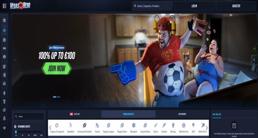 Man in superhero costume with soccer ball belly and drink helmet throws popcorn while watching sports on TV; surprised woman and small dog react in cozy living room. Promotional banner for Vegas Hero sports betting welcome bonus.